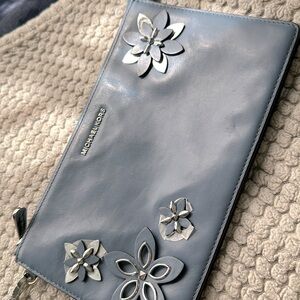 Michael Kors wristlet bag leather blue with floral detailing